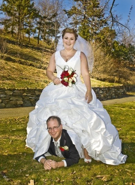 funny-wedding-photo-bride-rides-groom.jpg